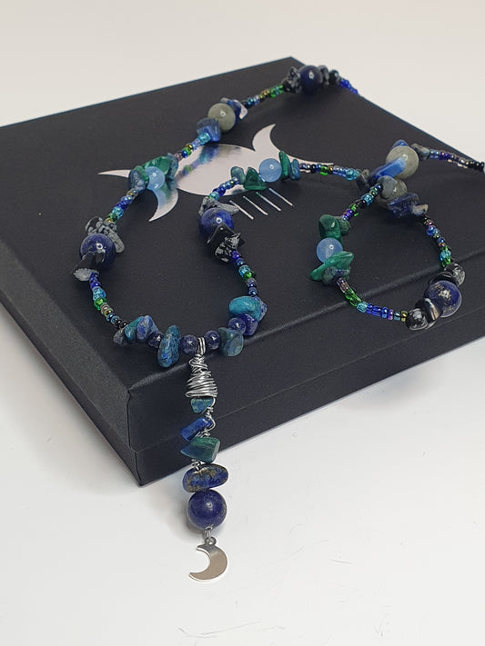 Blue Crystal Moon necklace. (Matching items available.)