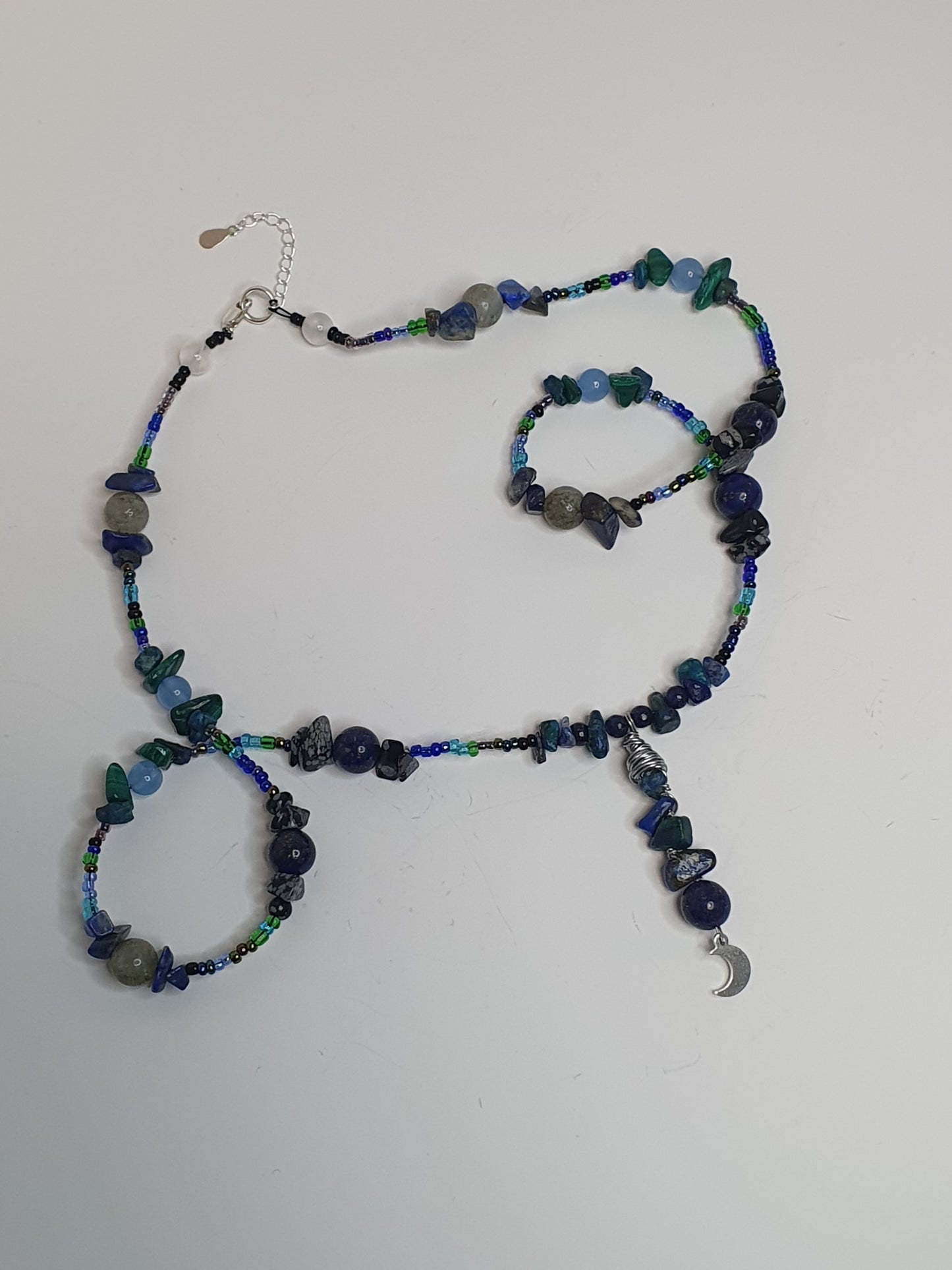 Blue Crystal Moon necklace. (Matching items available.)