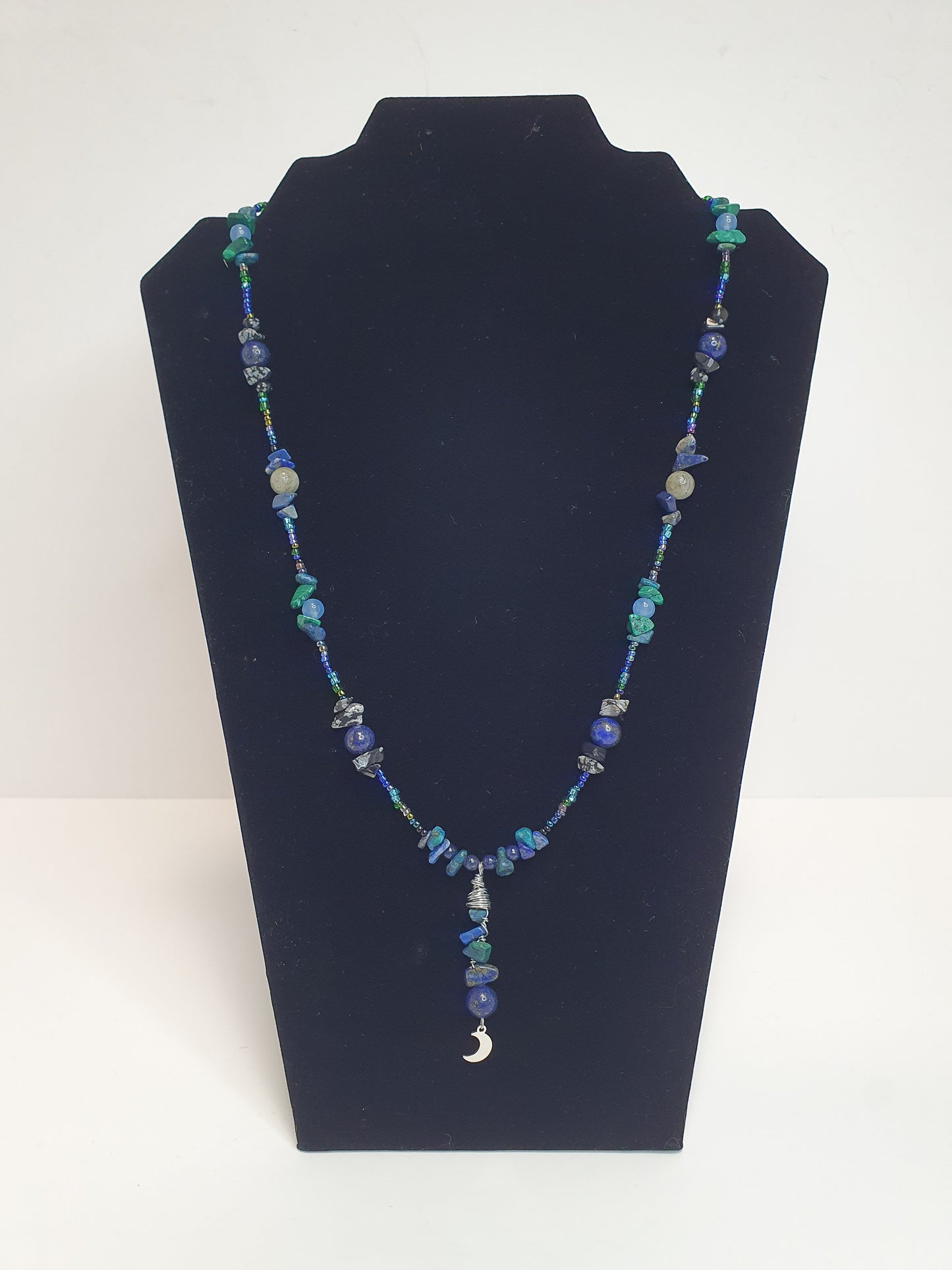 Blue Crystal Moon necklace. (Matching items available.)