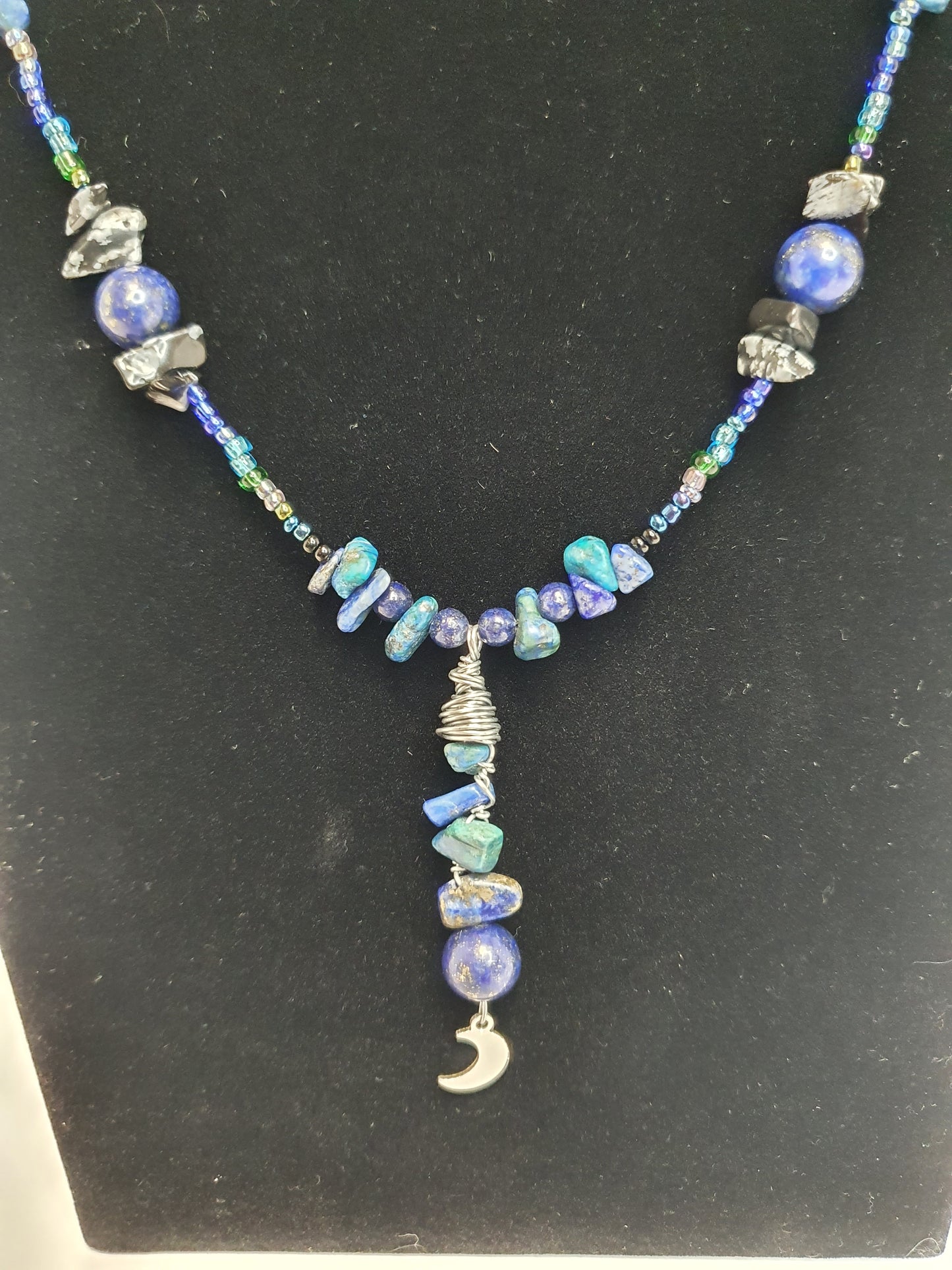 Blue Crystal Moon necklace. (Matching items available.)